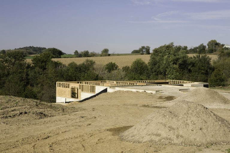 a new home is being built in the country