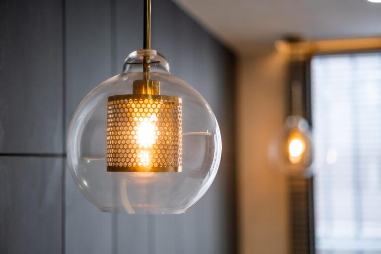 Vintage luxury interior lighting lamp cover with bronze plate and transparent glass bulb for home decor.