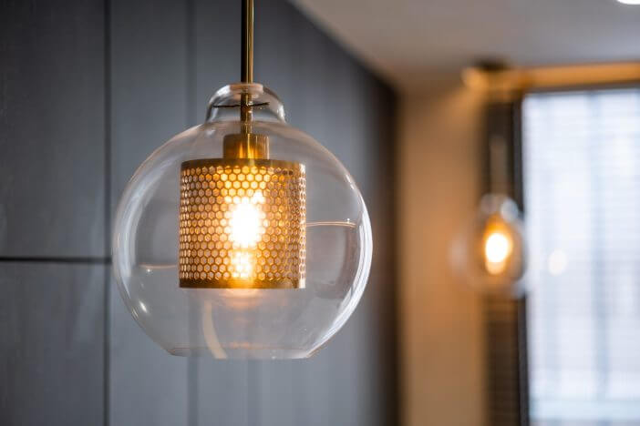 Vintage luxury interior lighting lamp cover with bronze plate and transparent glass bulb for home decor.