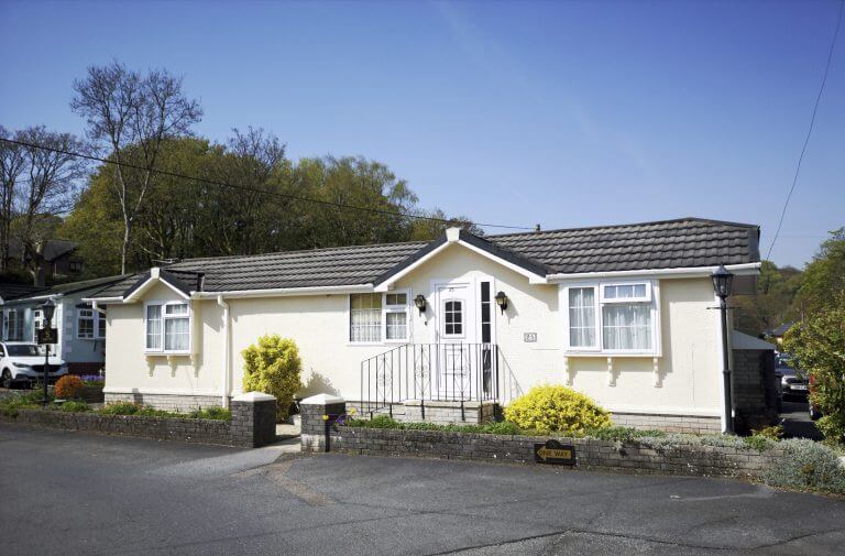 Swansea, UK: April 27, 2019: Residential mobile homes for retired persons only with gardens and car parking spaces.