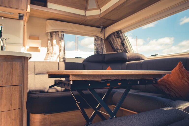 Travel Trailer RV Dining Area. Elegant Recreational Vehicle Interior.