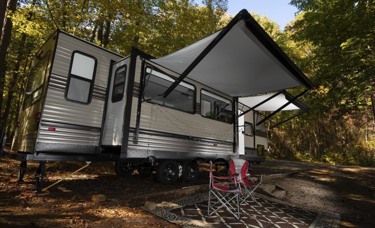 Travel trailer in the daytime during early fall at a Falls Lake campsite in North Carolina