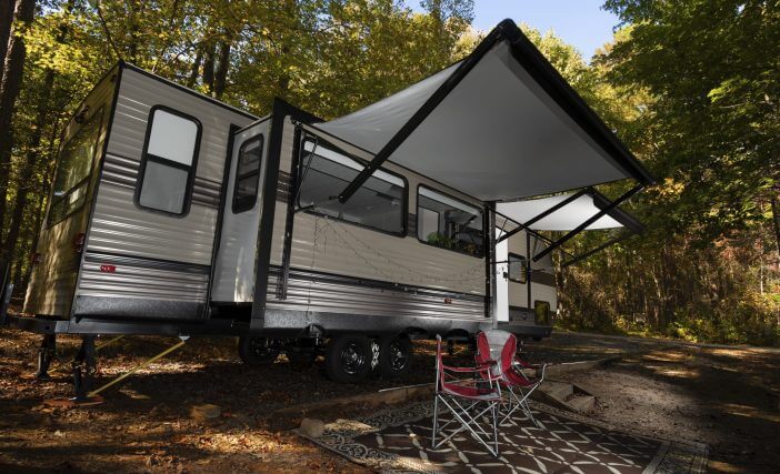 Travel trailer in the daytime during early fall at a Falls Lake campsite in North Carolina