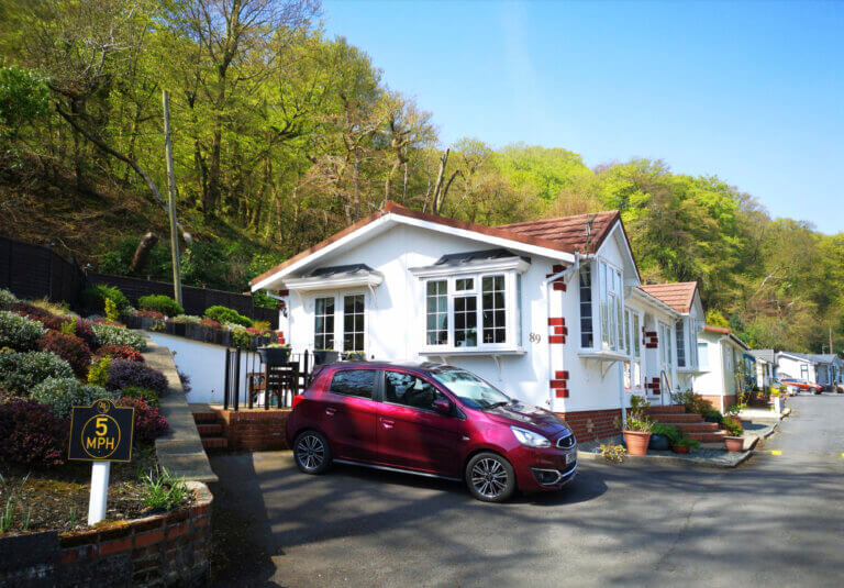 Swansea, UK: April 27, 2019: Residential mobile homes for retired persons only with gardens and car parking spaces.