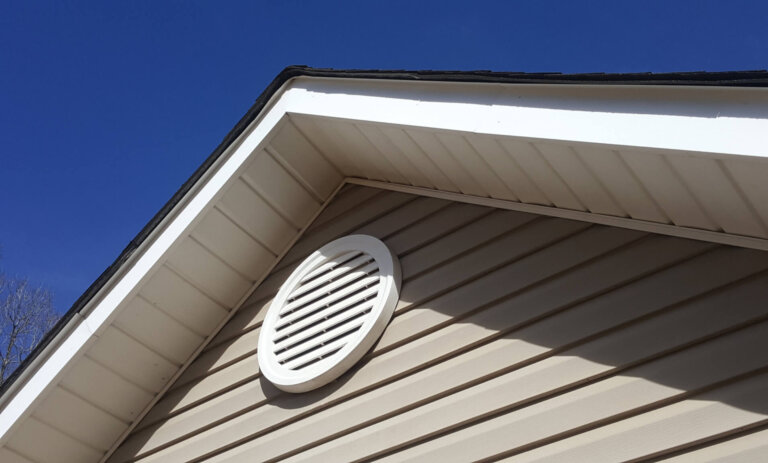 Closeup of a roof vent on a house.