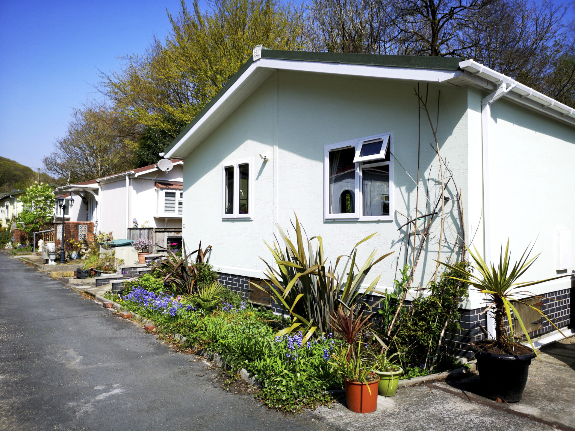 Swansea, UK: April 27, 2019: Residential mobile homes for retired persons only with gardens and car parking spaces.
